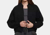 Jaqueta New Balance French Terry Bomber